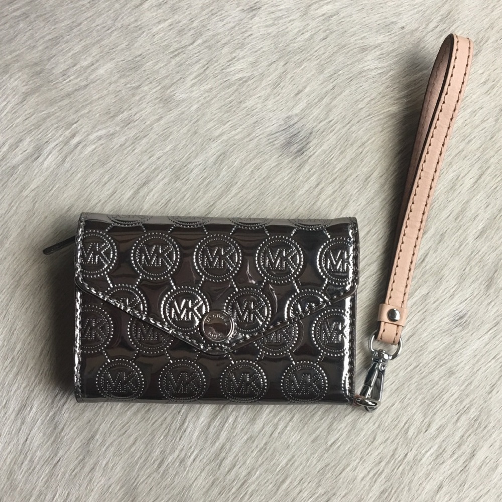 Michael Kors patent silver leather wallet.